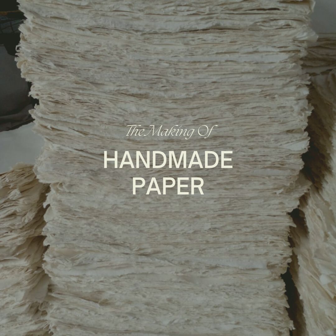 Stacks of textured handmade paper with natural fibers and deckled edges — illustrating the beginner-friendly process and beauty of traditional papermaking craftsmanship.