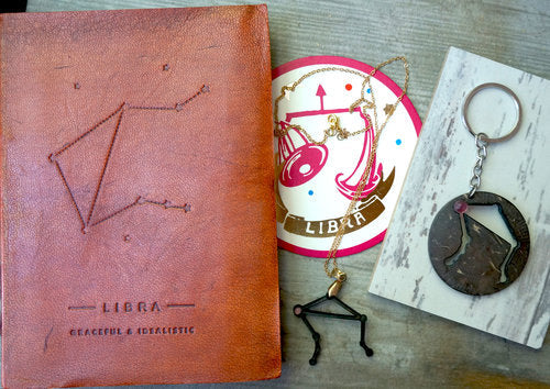 Elegant Libra zodiac symbol with balanced scales and soft celestial elements — capturing the harmonious, beauty-driven energy of Libra season focused on balance, relationships, and self-reflection.