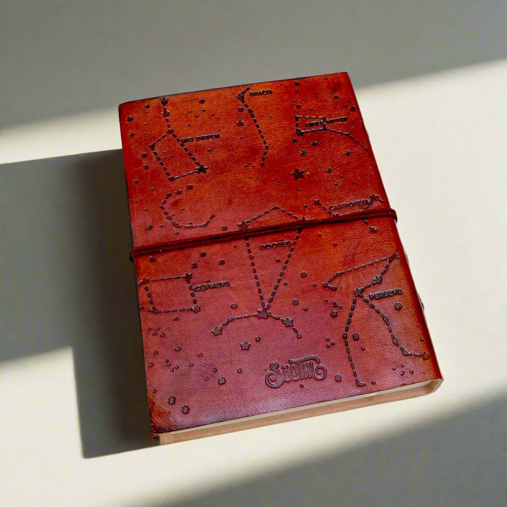 Earth-toned leather journal featuring embossed life quote – thoughtful companion for journaling and sketching on the go