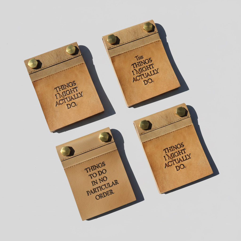 Full range of four leather notepad titles together