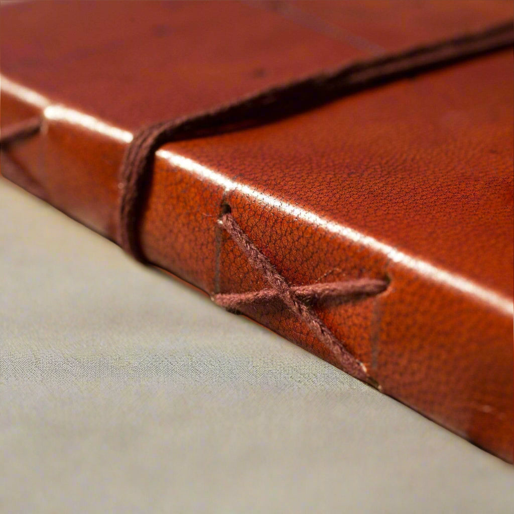 5x7 leather journal closed with string-tie wrap