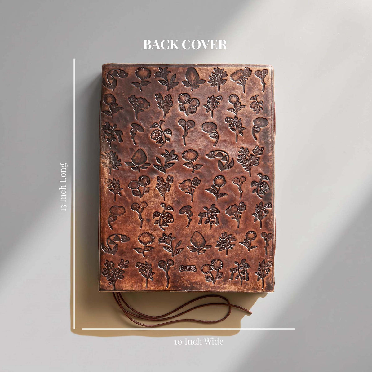Back cover of Flower Chart Leather Journal with embossed flower chart