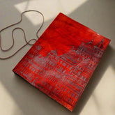 Leather journal embossed with European architecture – handcrafted notebook featuring charming cityscape details, perfect for travel notes, sketching, and journaling