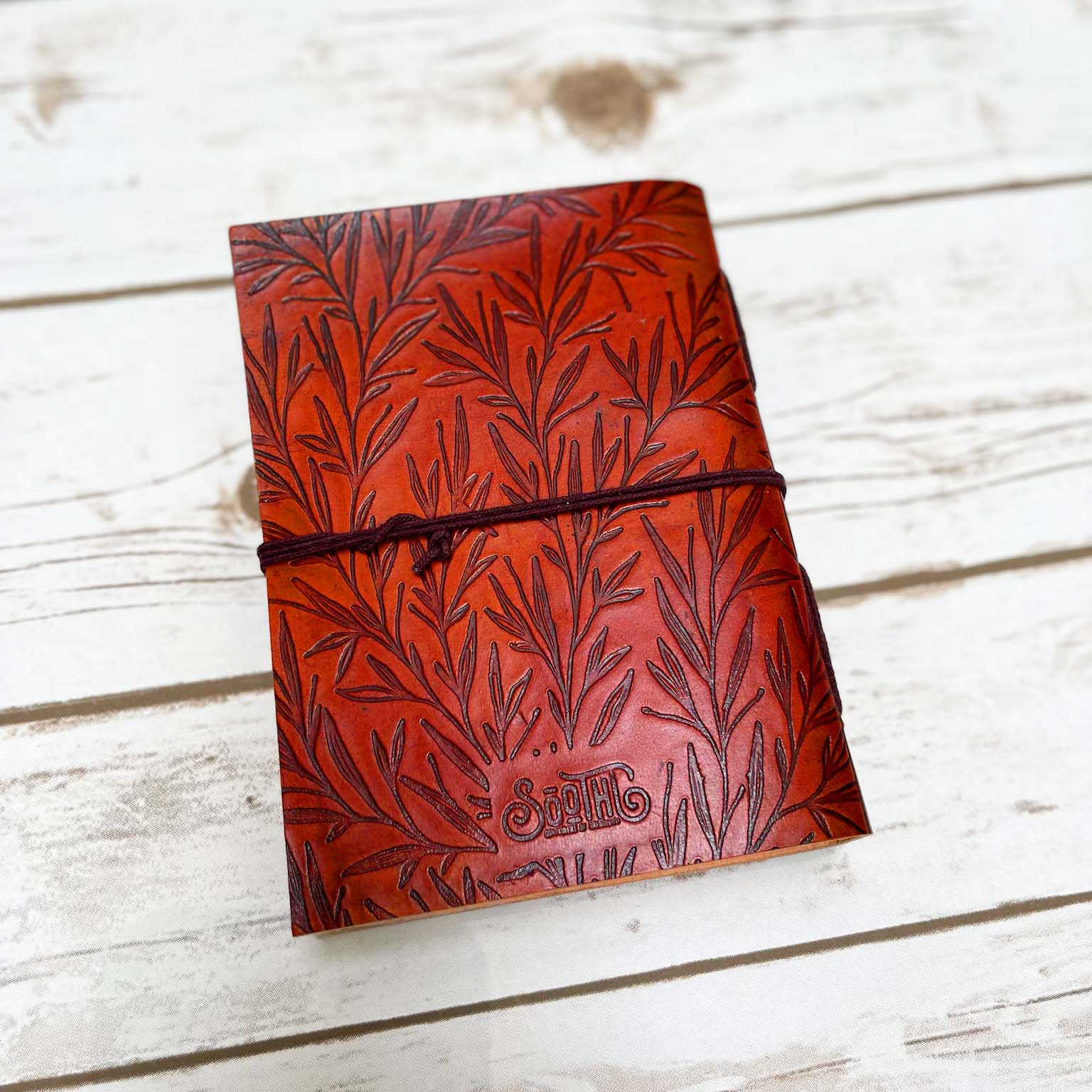 Salvaged leather journal with inspirational quote and leaves embossed in the cover – perfect for gifting to moms, sister, grandma, and girlfriend