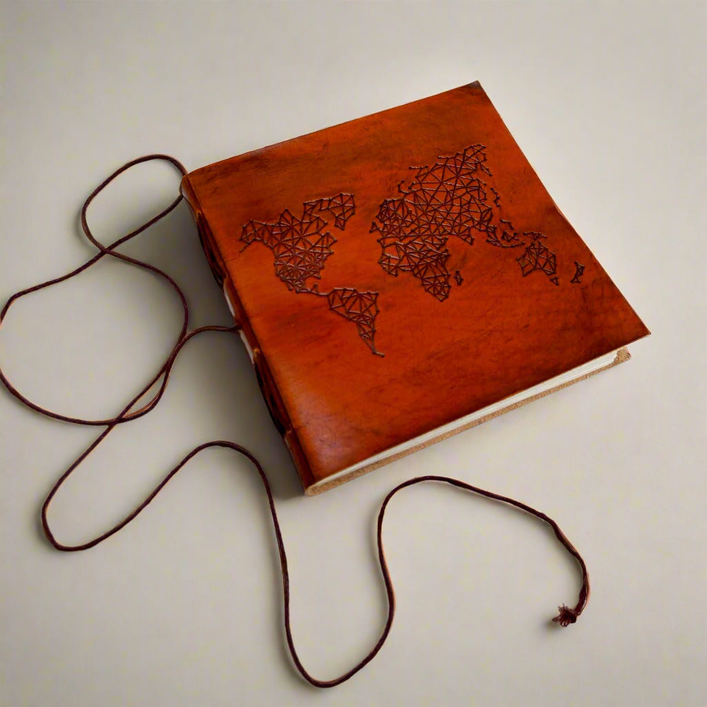 Adventure-ready leather journal – world map embossing for documenting memories from every corner of the globe