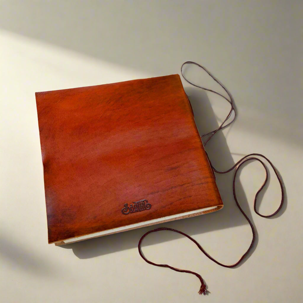 Adventure-ready leather journal – world map embossing for documenting memories from every corner of the globe
