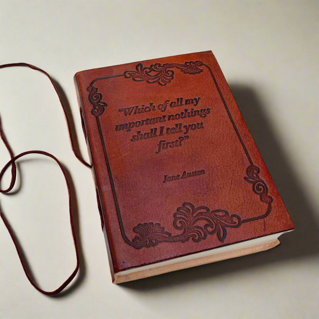 Earth-toned leather journal featuring embossed life quote – thoughtful companion for journaling and sketching on the go