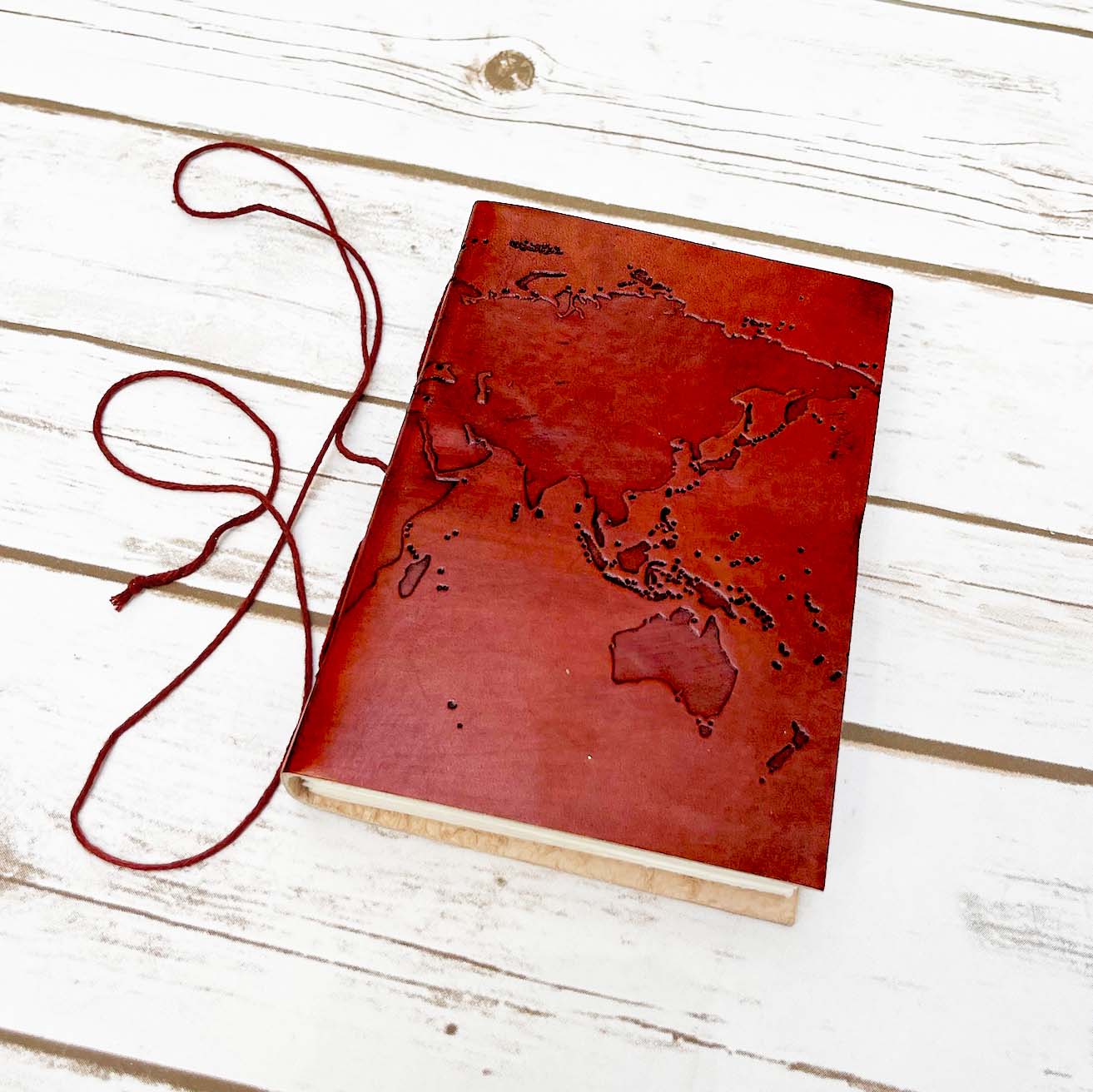 Vintage-style world map leather journal – ideal gift for travelers, writers, and geography lovers