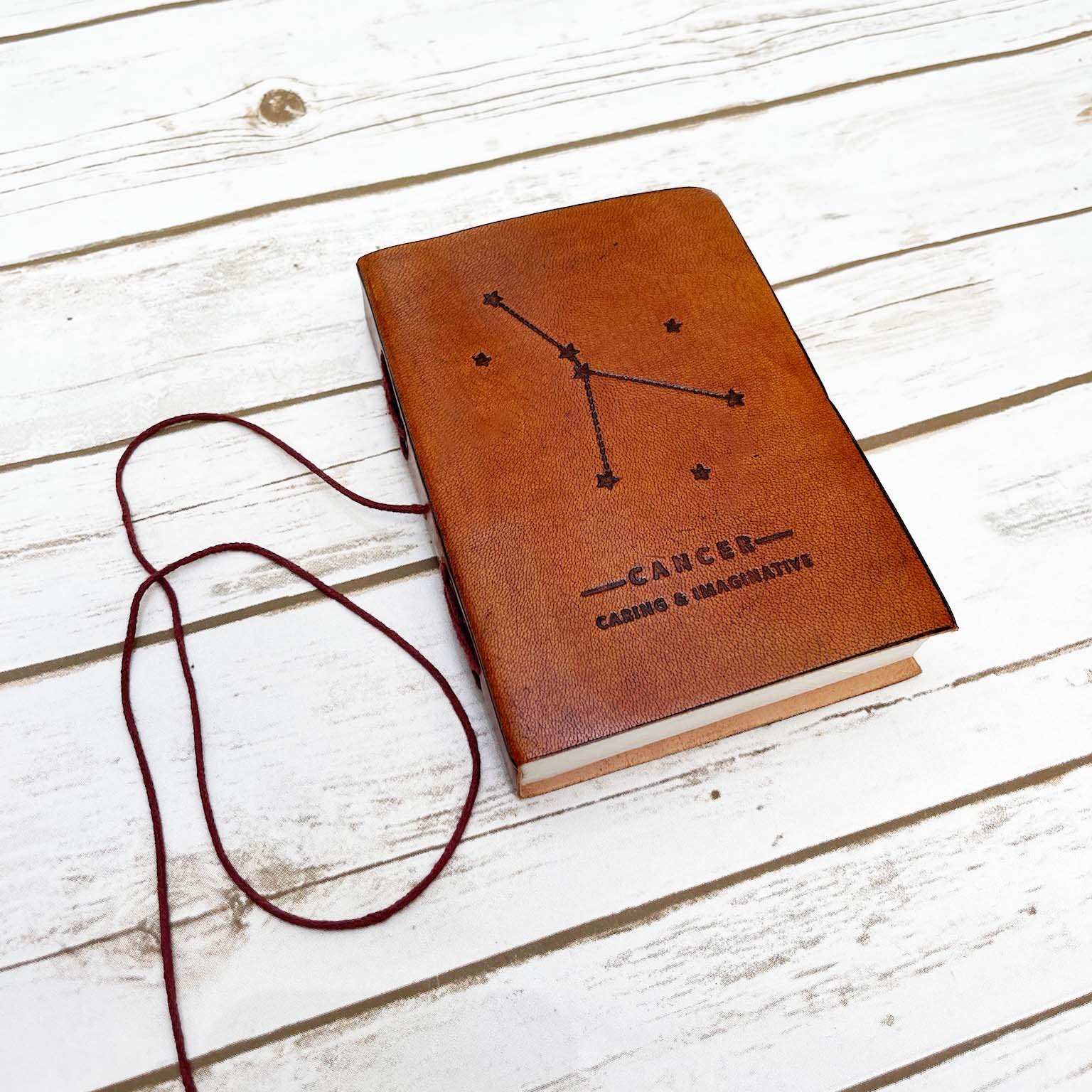 Astrology journal in leather cover – beautifully crafted for writing about your zodiac journey and planetary alignments