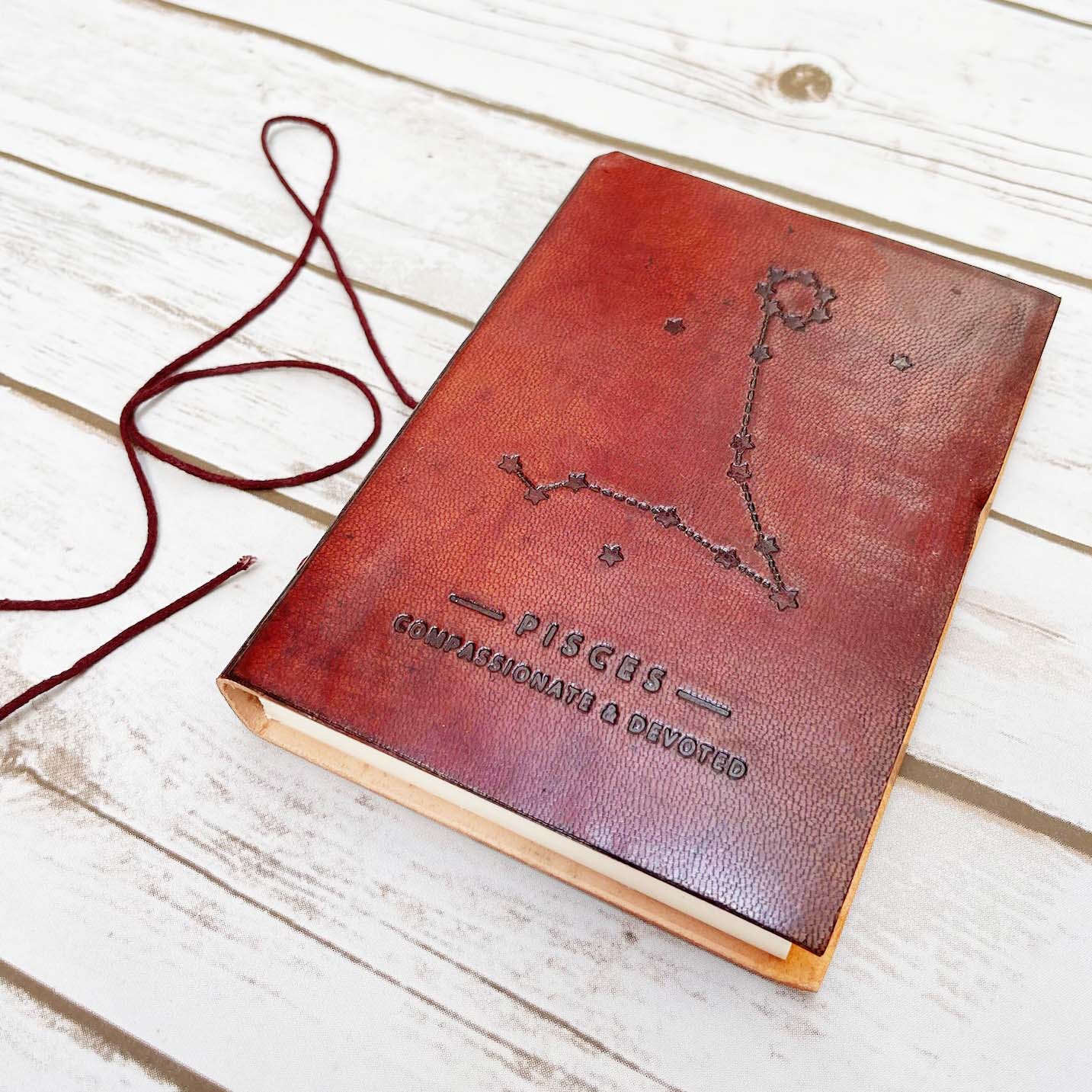 Astrology journal in leather cover – beautifully crafted for writing about your zodiac journey and planetary alignments