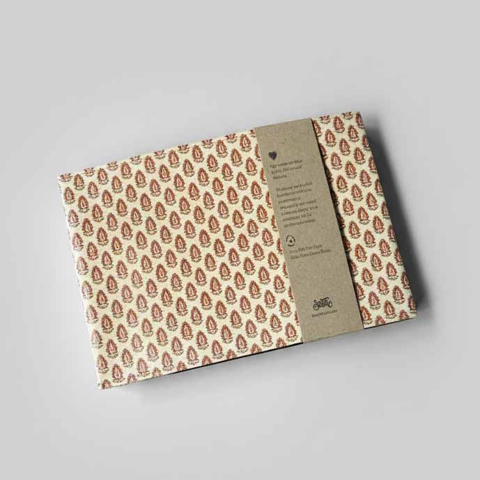 Jaipur leather sketchbook open to unlined khadi cotton paper pages