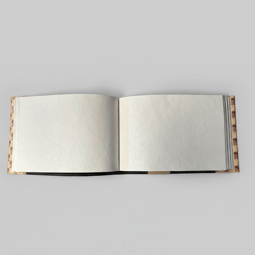 Landscape leather sketchbook showing 10 by 7 inch size