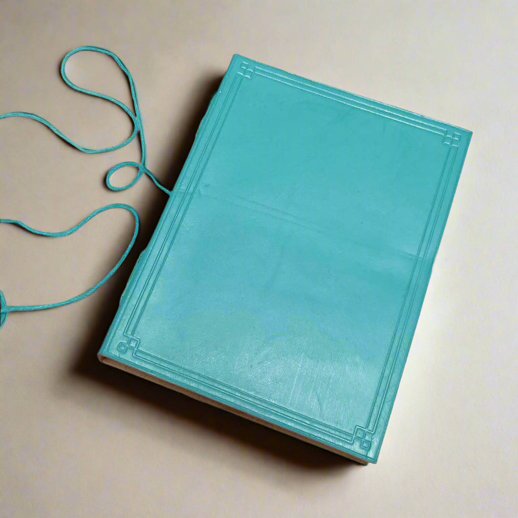 Plain Cover Leather Journal with custom black-ink personalization on the front cover.