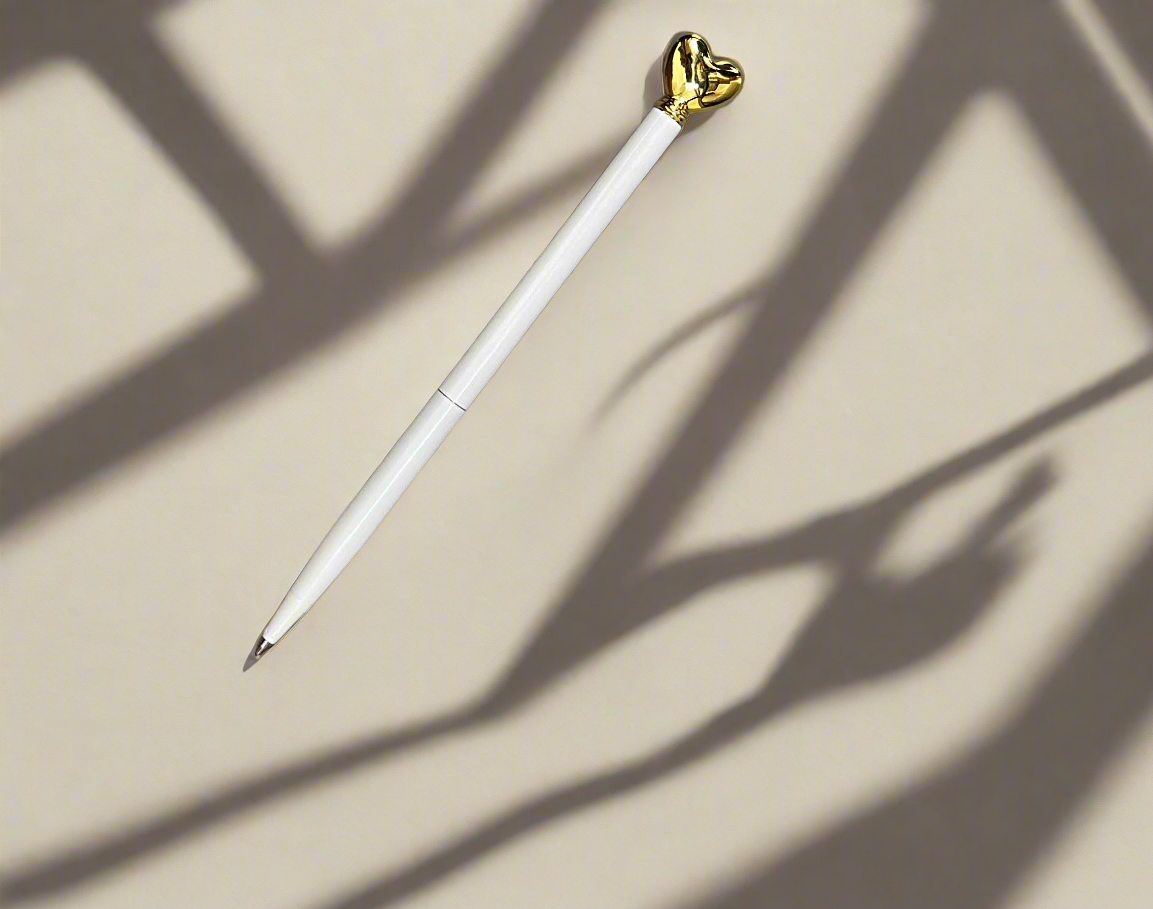 Minimalist cute pen with heart shape โ sleek, durable, and refillable for zero-waste writing
