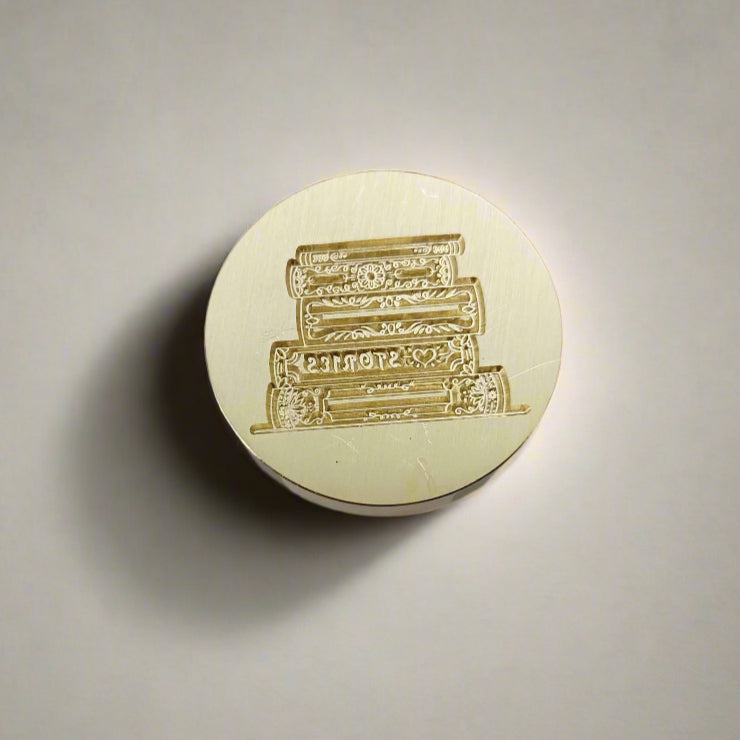 Gold-toned wax seal with stacks of books engraving – classic detail for modern creatives, old-soul writers, and bookworms
