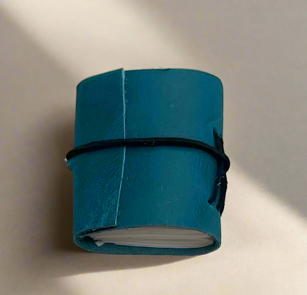 Miniature leather journal – pocket-sized notepad for thoughts, ideas, and on-the-go writing