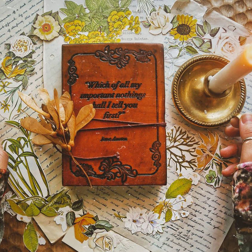 Earth-toned leather journal featuring embossed life quote – thoughtful companion for journaling and sketching on the go