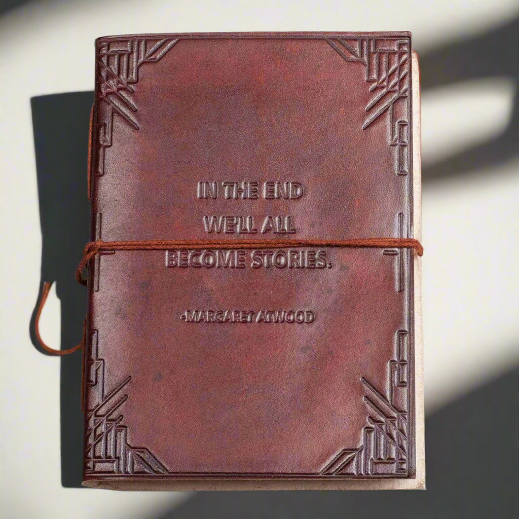 Rustic leather diary with embossed quote “We all become stories” – perfect for dreamers and creatives