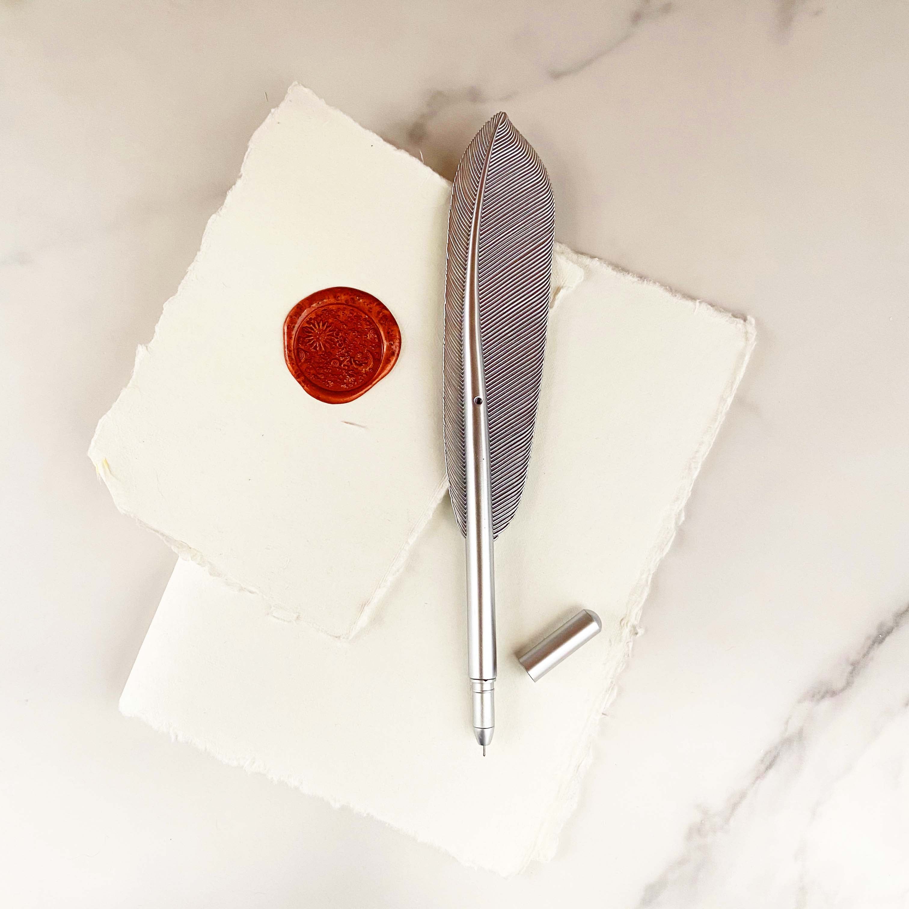 Quill-inspired feather pen – shiny gold and silver finish for poetic writing moments