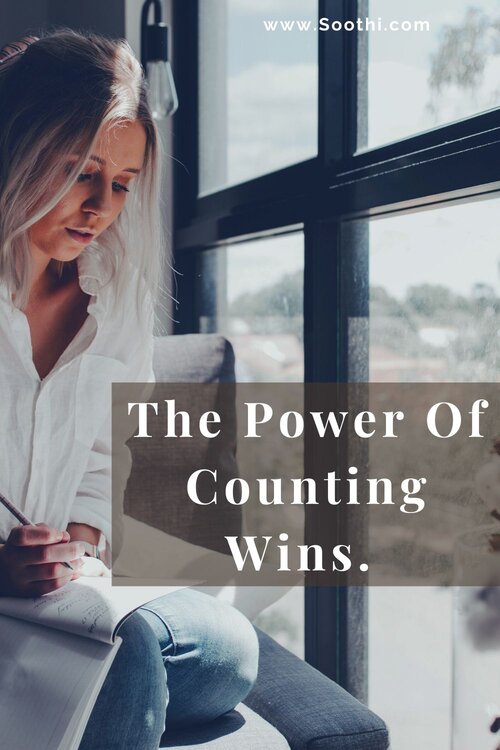 Notebook with a list of small wins and checkmarks — symbolizing the power of acknowledging progress, boosting motivation, and building a positive mindset through daily victories.