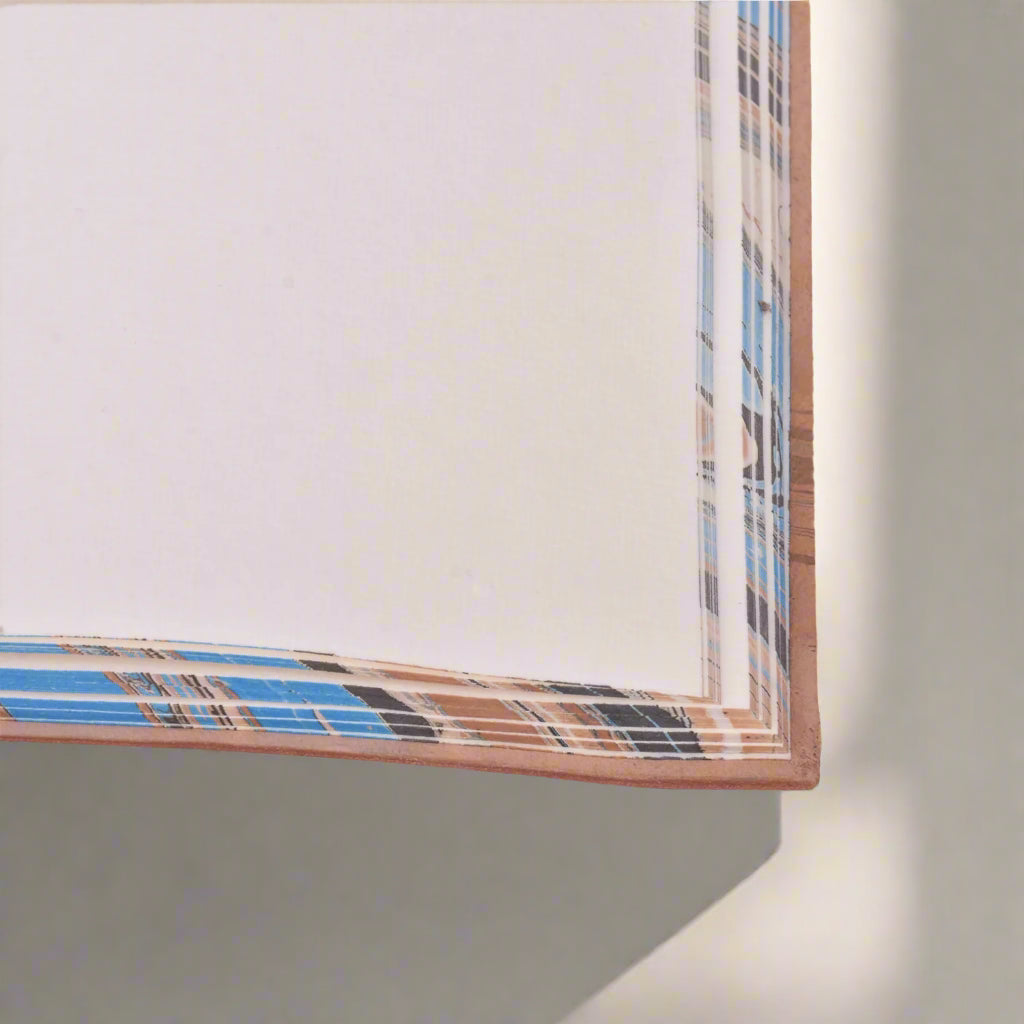 Plaid patterned paper with a white background