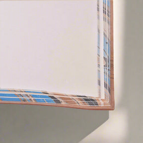 Plaid patterned paper with a white background