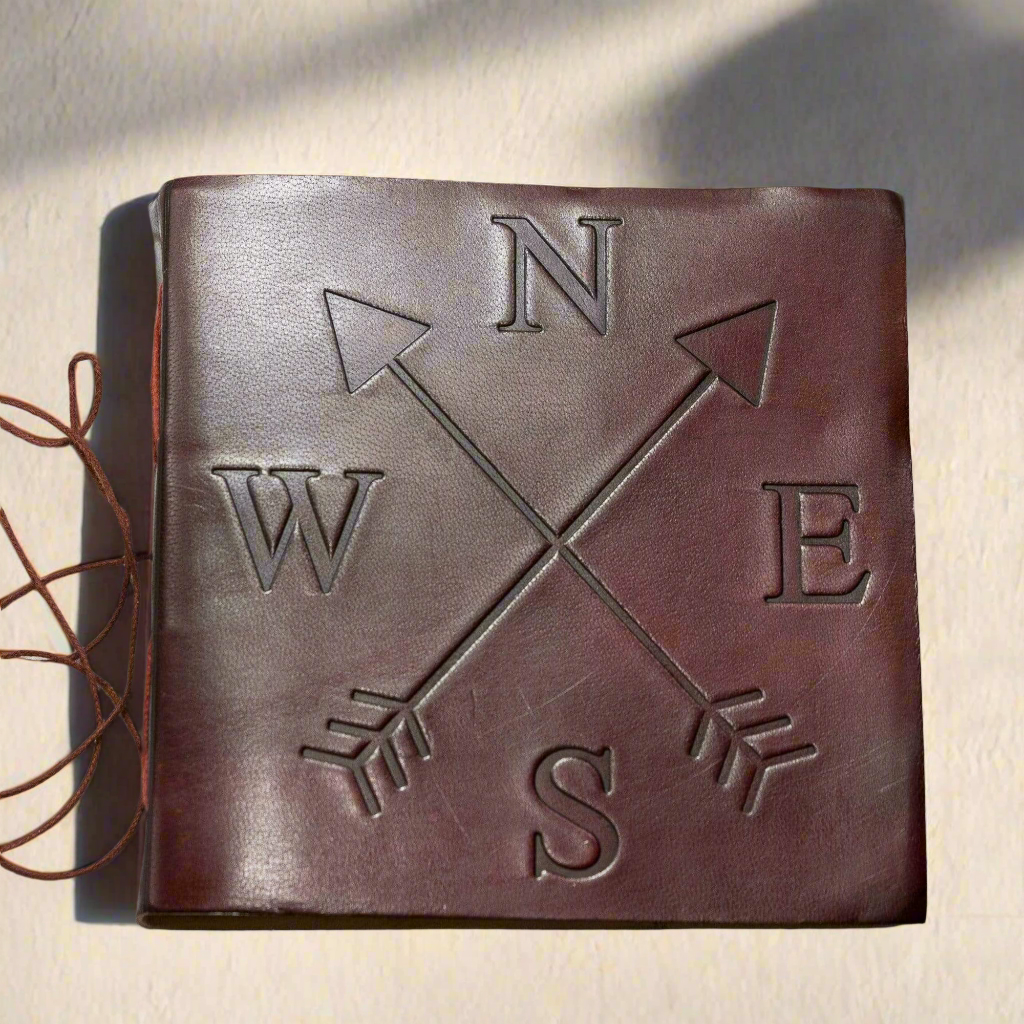 Compass 7x7 leather journal with embossed compass rose cover