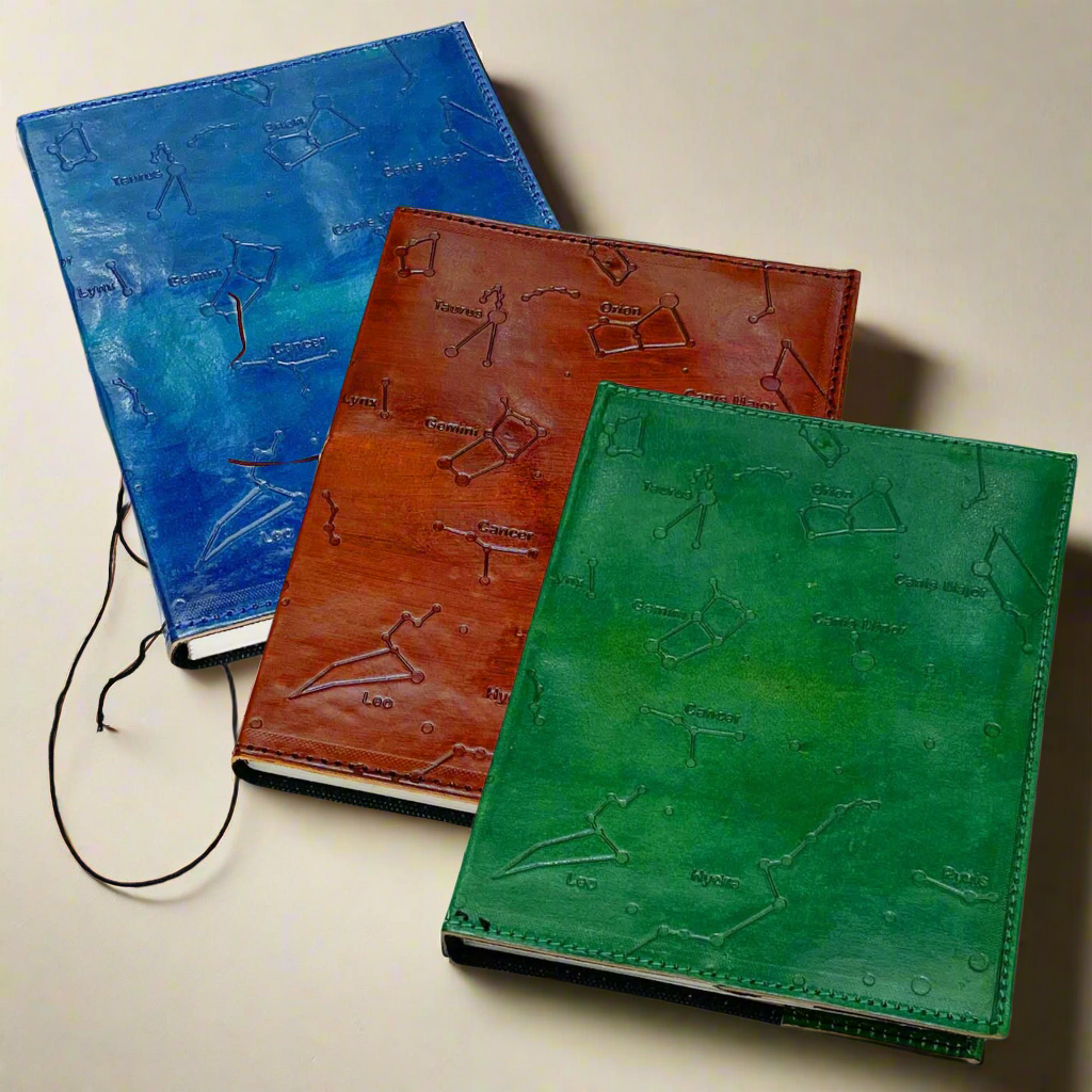 Constellation Refillable Embossed Leather Journal with celestial cover design.