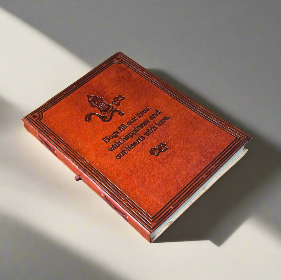Dogs Fill Our Lives With Happiness brown leather journal photographed from a different angle