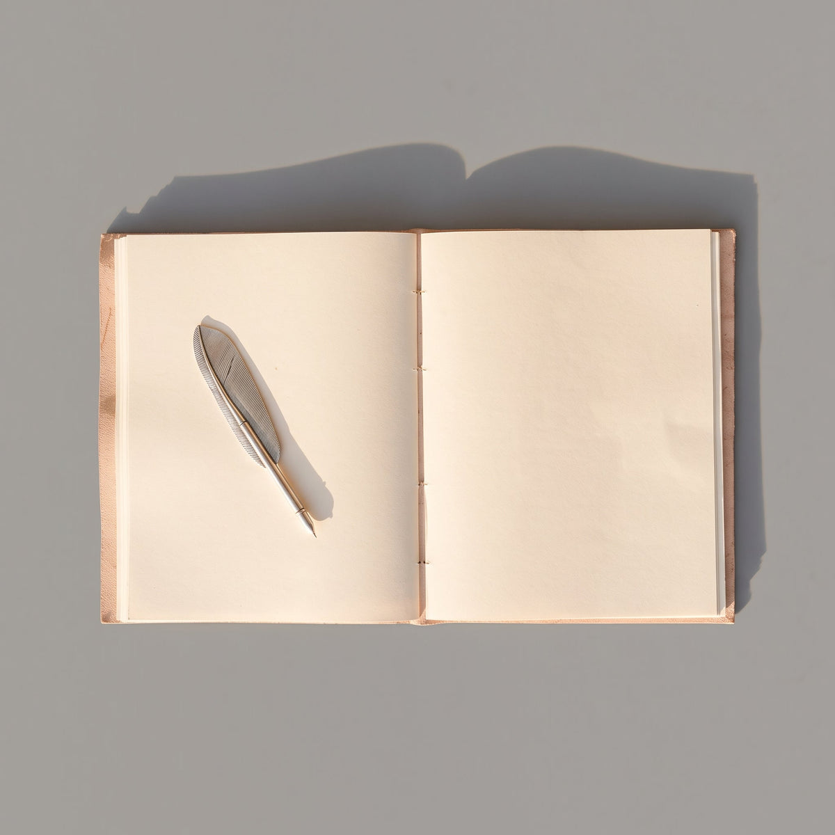 Flower Chart Leather Journal open to unlined handmade paper pages