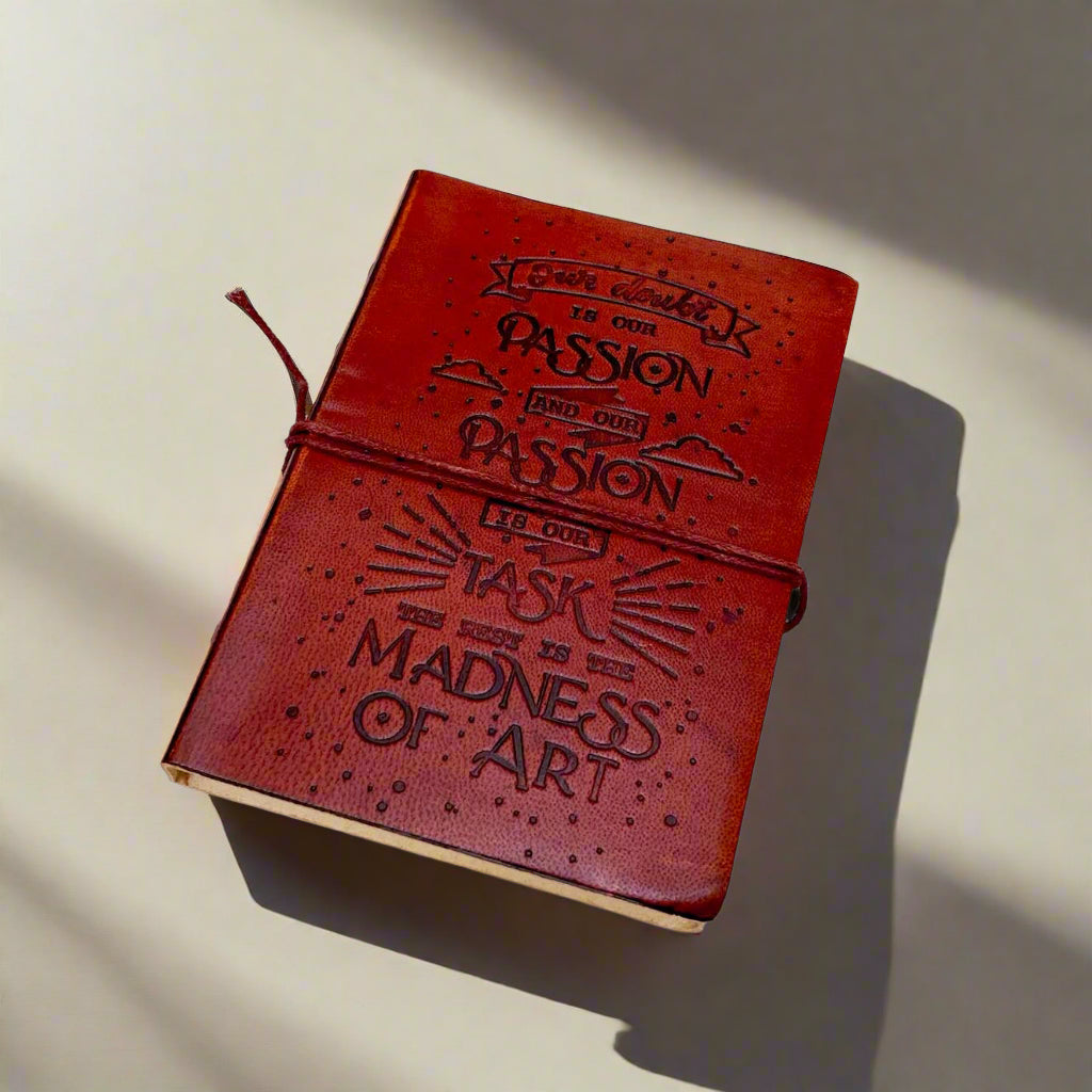 Different angle of the Henry James Our Doubt Is Our Passion Leather Journal showing the cover and page edges