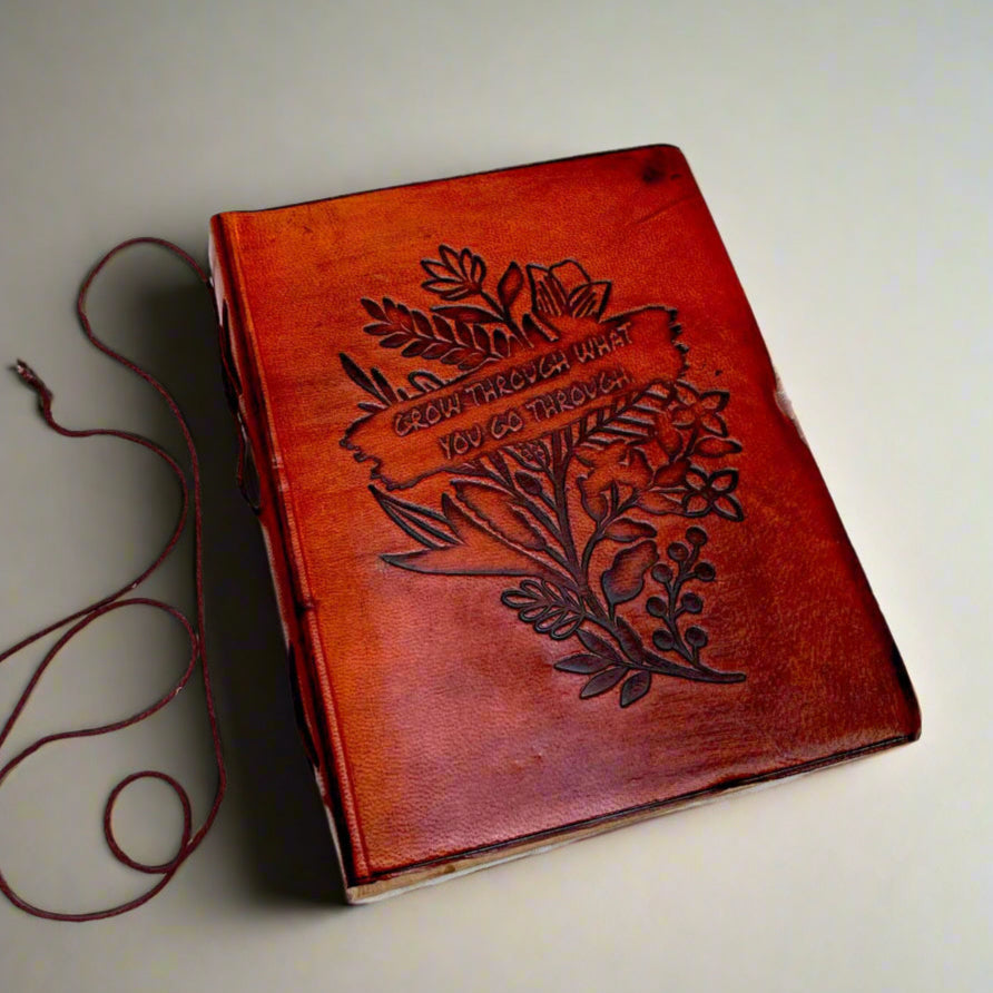 Handcrafted notebook embossed with powers - designed for your perfect healing partner, reminding you that every challenge in life holds an opportunity for evolution and new beginnings