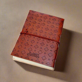 Rustic leather diary with embossed quote “We all become stories” – perfect for dreamers and creatives