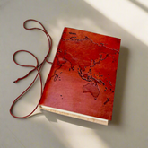 Vintage-style world map leather journal – ideal gift for travelers, writers, and geography lovers