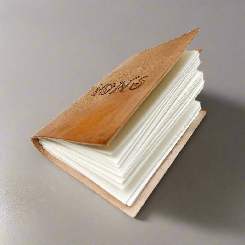 Handcrafted leather vow book – ideal for guest lists, speeches, and intimate wedding notes