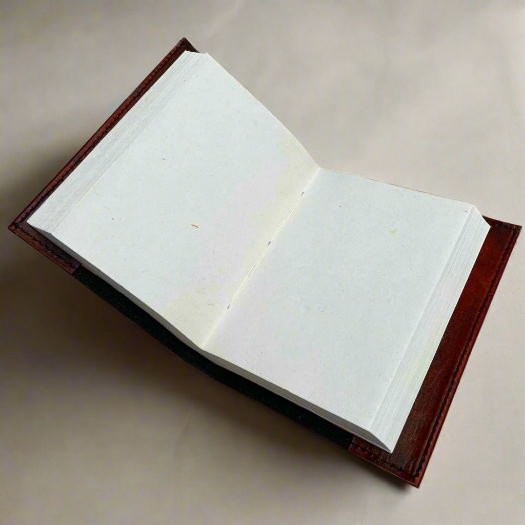 Eco-friendly leather journal with 120 gram handmade paper from cotton waste 
