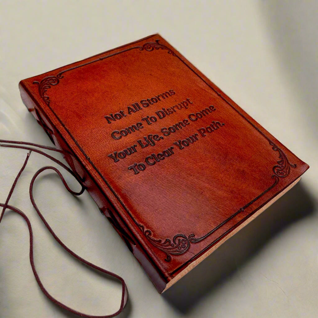 Not All Storms journal standing with string tie unwound