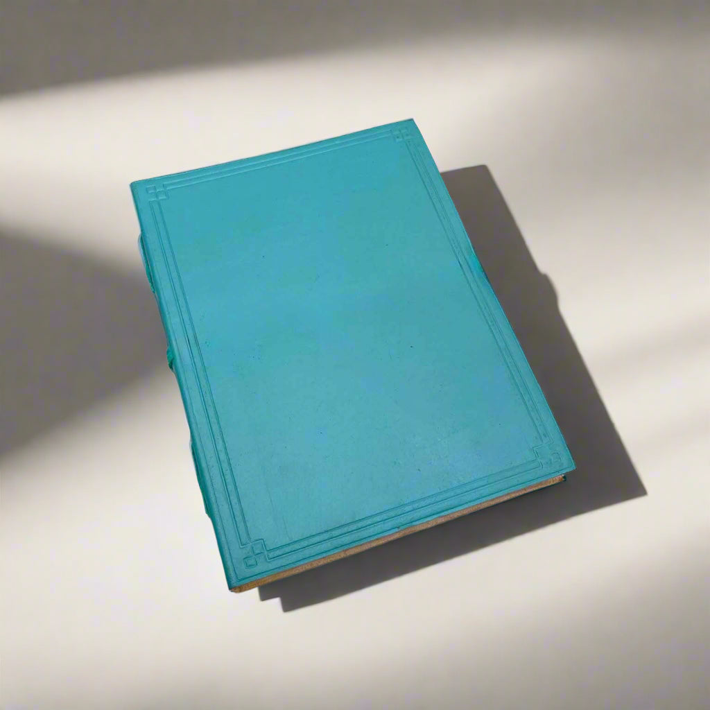 Personalized Plain Cover Leather Journal with a custom front-cover name or message.