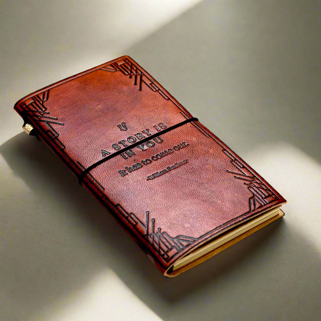 If A Story debossed cover detail on the Quote Leather Travel Notebook.