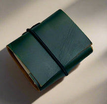 Miniature leather journal – pocket-sized notepad for thoughts, ideas, and on-the-go writing