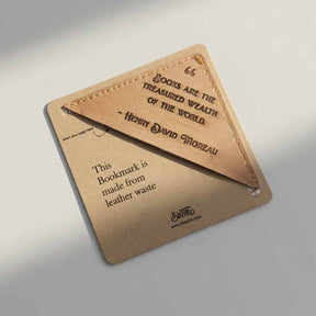 Leather bookmark with text on a light gray background