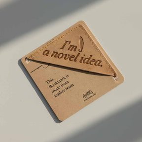 Leather bookmark with text on a light background