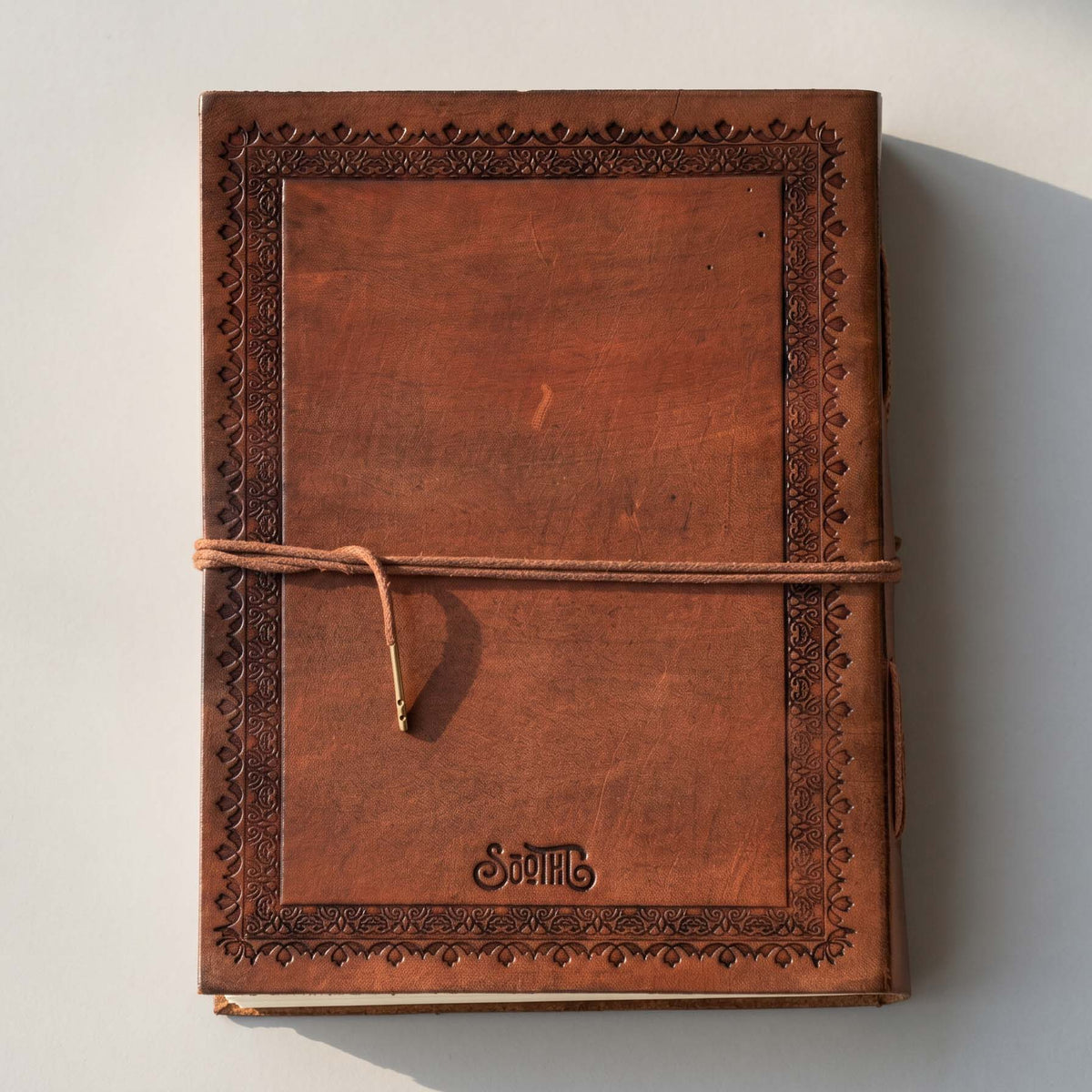Desire Beyond Daily Life Quote Leather Journal