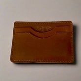 Genuine leather wallet – available in teal, purple, and brown for a pop of personality with timeless style