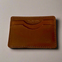 Genuine leather wallet – available in teal, purple, and brown for a pop of personality with timeless style