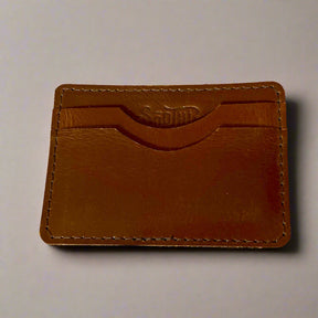 Genuine leather wallet – available in teal, purple, and brown for a pop of personality with timeless style