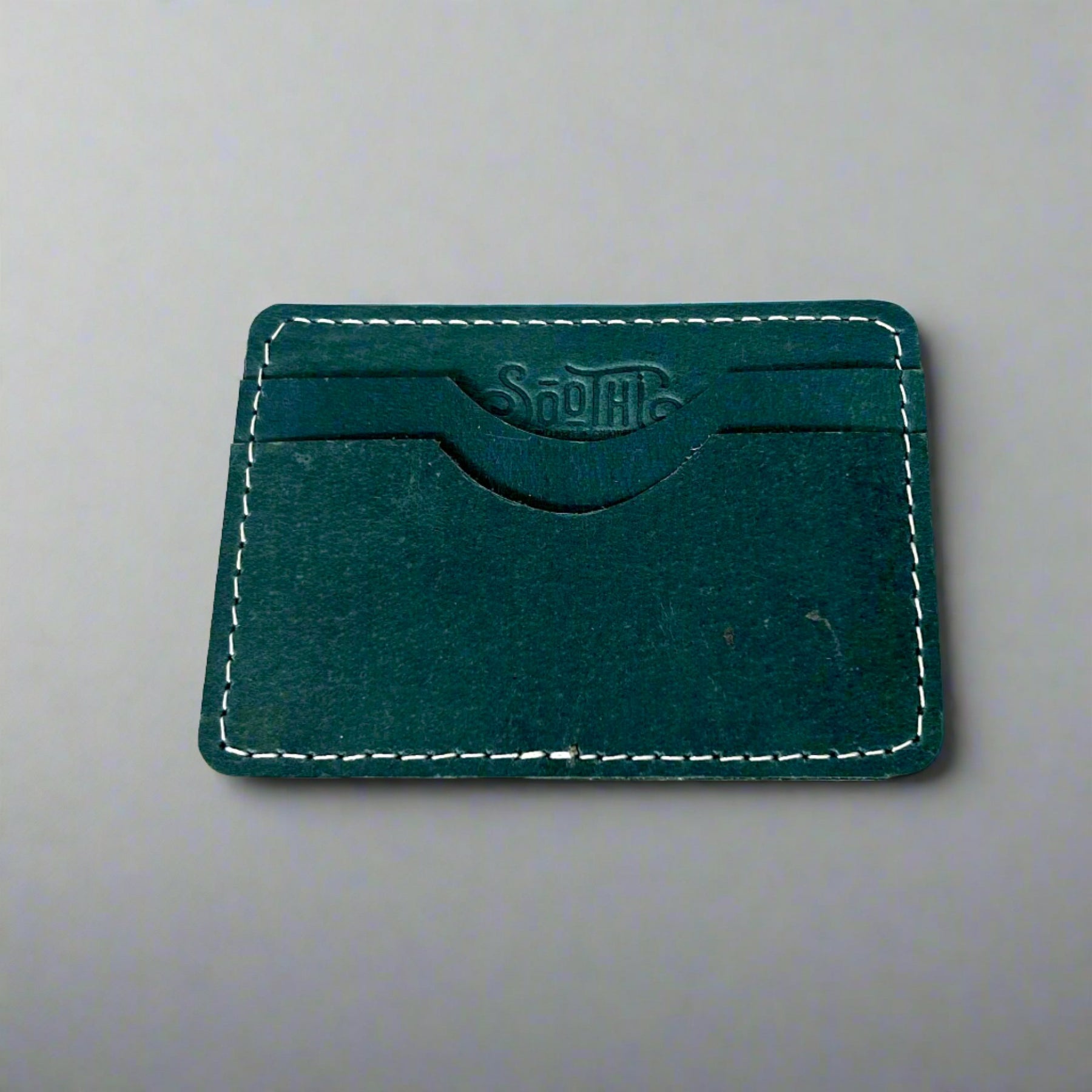 Genuine leather wallet – available in teal, purple, and brown for a pop of personality with timeless style
