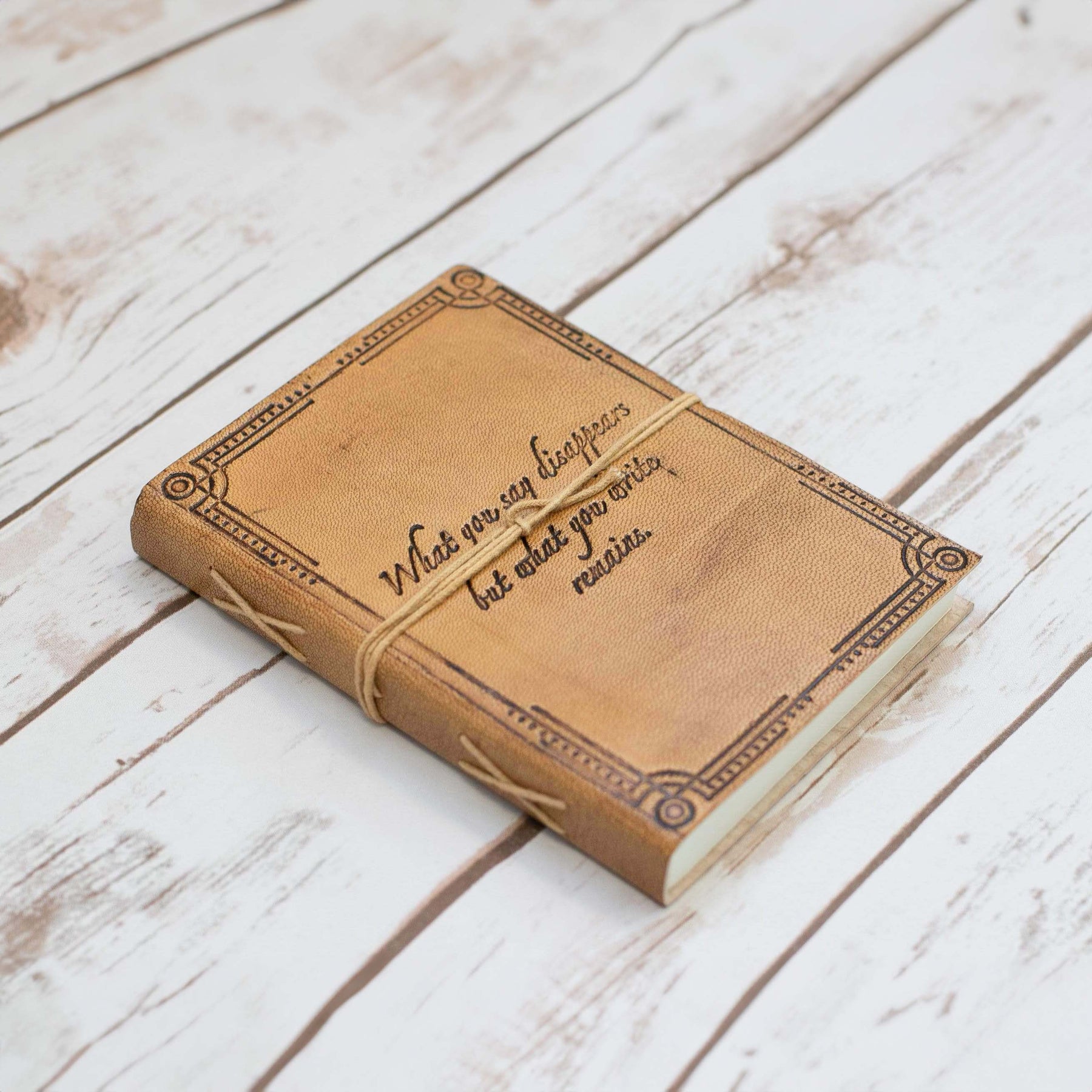 What You Write Remains Quote Leather Journal - 7x5