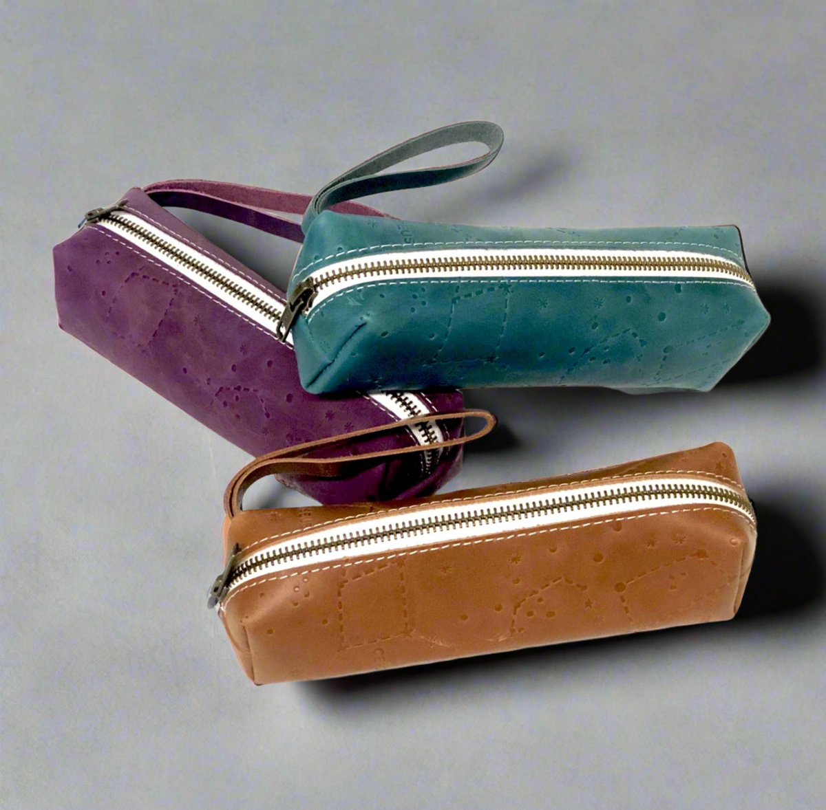 Soothi handcrafted leather pouch with Astrological motif – perfect blend of style, utility, and celestial charm