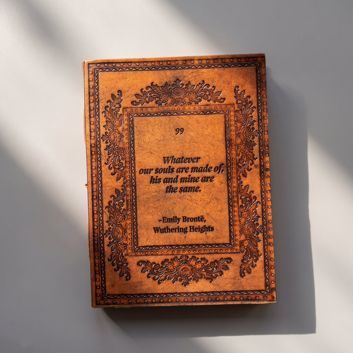 Whatever Our Souls Are Made Of brown leather journal viewed from another angle